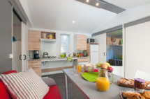 Serignan Plage campsite Herault Cottage Persons with Reduced Mobility 3 Flowers 2 bedrooms Bedroom Living area Kitchen